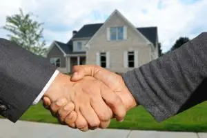 Shaking hands with your Real Estate Agent 