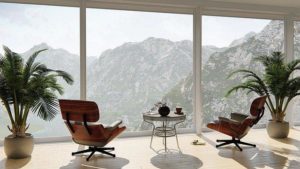 A living room with a great view of the mountains.