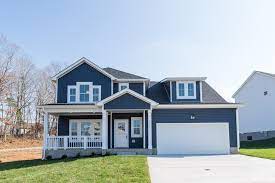 Blue two story home for sell in Clear Springs subdivision in Clarksville TN. Homes in Clear Springs are build by Hawkins Homes LLC.