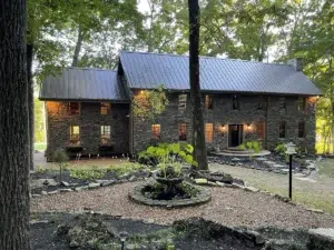 Large Stone mansion in the woods for sale in Adams TN