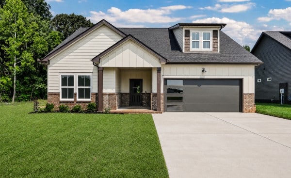 New homes for sale in Miller Farm. One story, white siding with a bonus room above the garage.